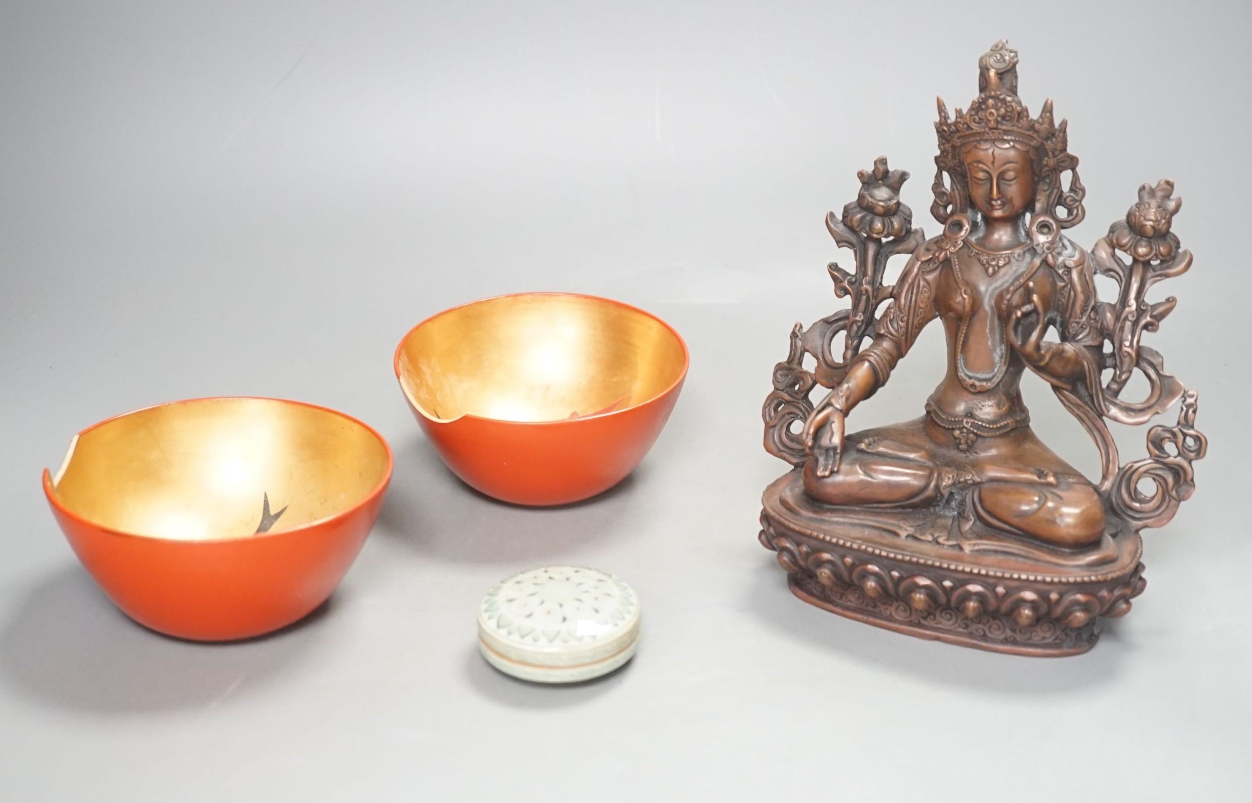 A Sino-Tibetan bronze Bodhisattva, two Japanese lacquer ‘fish’ bowls and a Korean celadon ground seal paste box and cover. Tallest 20cm